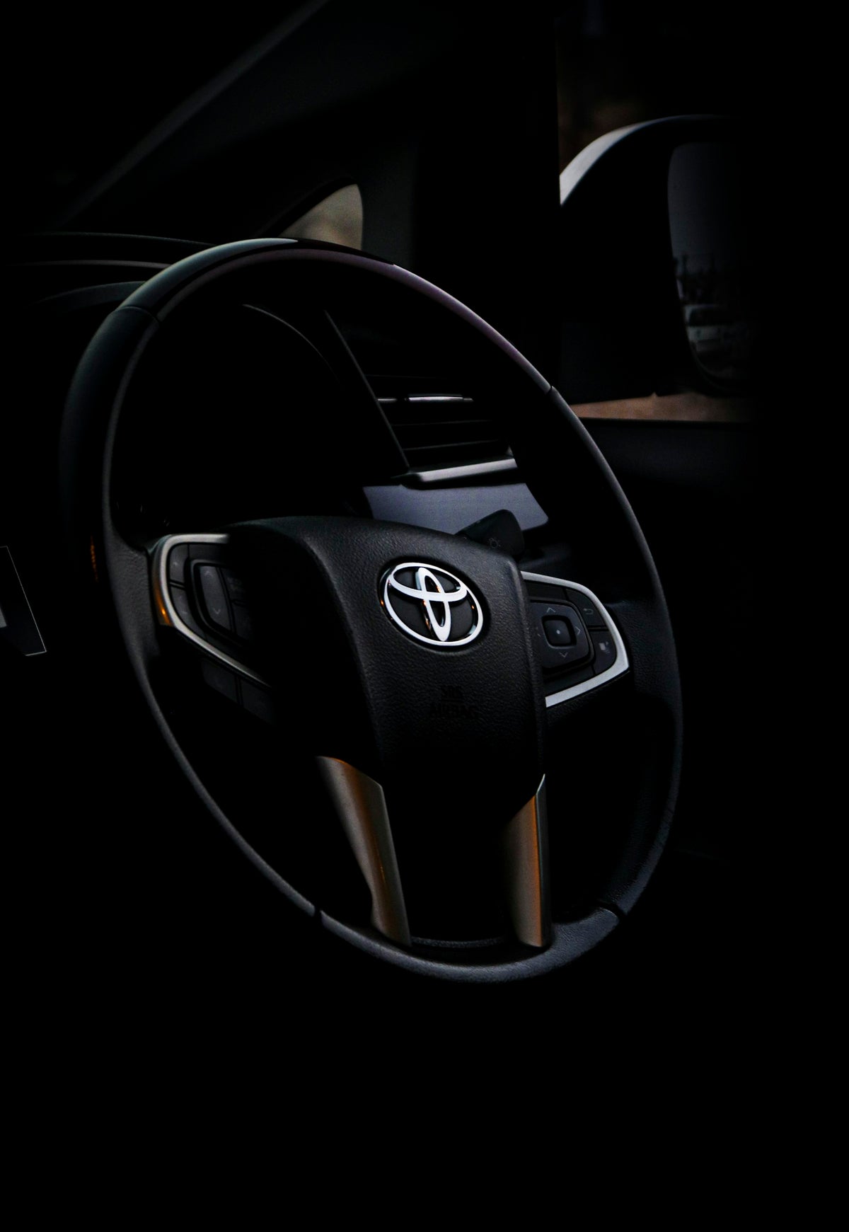 black and silver mercedes benz steering wheel