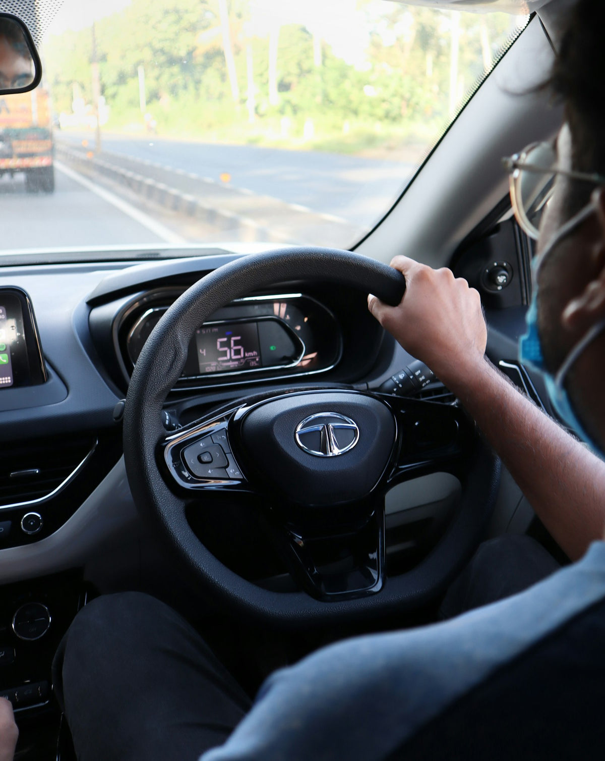 person driving car during daytime